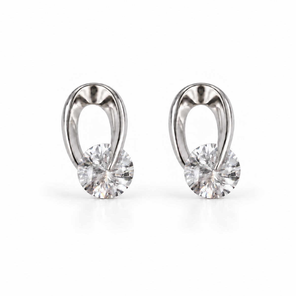 Rotating Volute Earrings — A Curve Around the Light