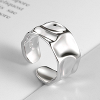 Sculpted Asymmetry Ring